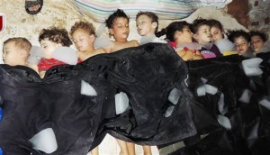 Some of the hundreds of civilian victims of the Sarin Nerve Gas massacre in Ghouta. Gassed in their beds by the Syrian regime.
