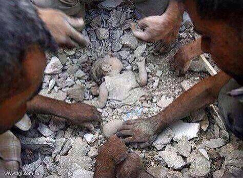 One of the innocent victims of the bombing of Azaz. The Assad regime kills them an the world lets them dig the dead infants out with their bare hands.  This picture has also circulated with great success as having happened in Gaza. 