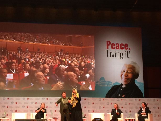 Shirin Ebadi and Tawakkul Karman on stage at the summit of Nobel Laureates The embrace between Shirin Ebadi and Tawakkul Karman on stage at the summit of the Nobel prize winners (Photo: Wired) 